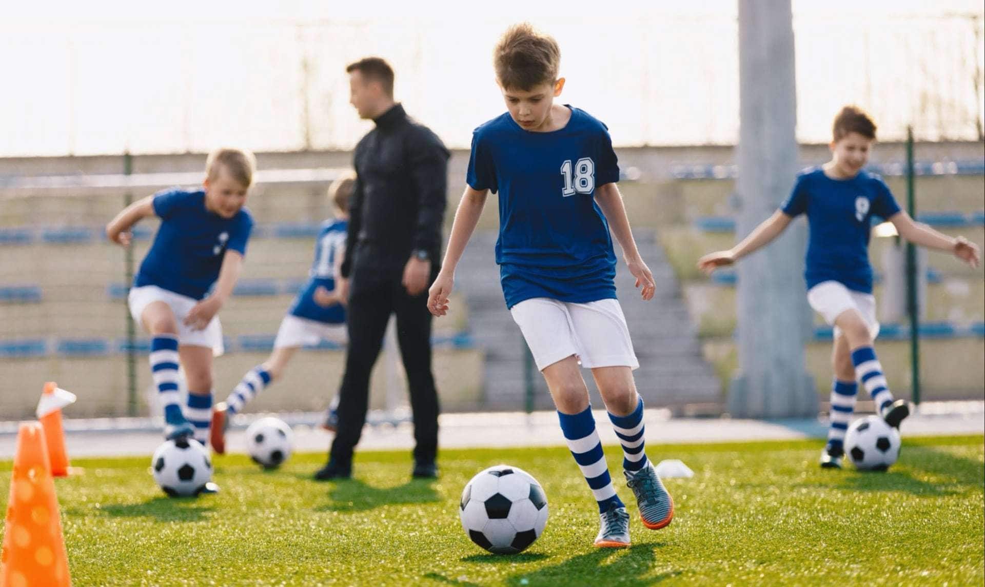children playing football in a team