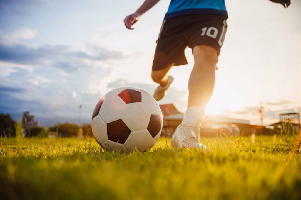 junior player learning football