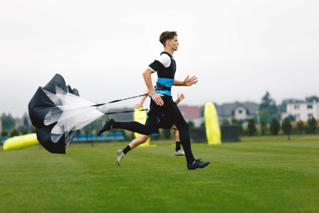 junior player working hard on the soccer pitch