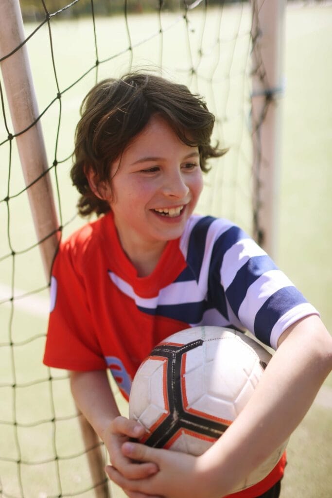 young boy with a ball